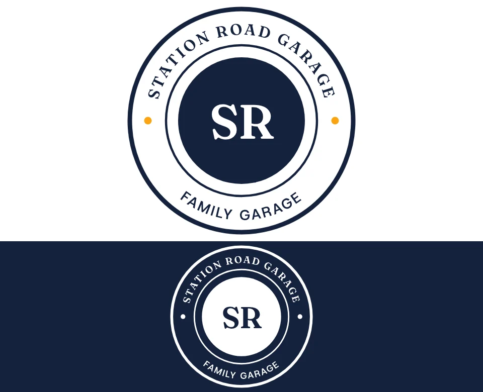 Family garage logo concept for Station Road Garage: a round badge, shown on white and on its own colour